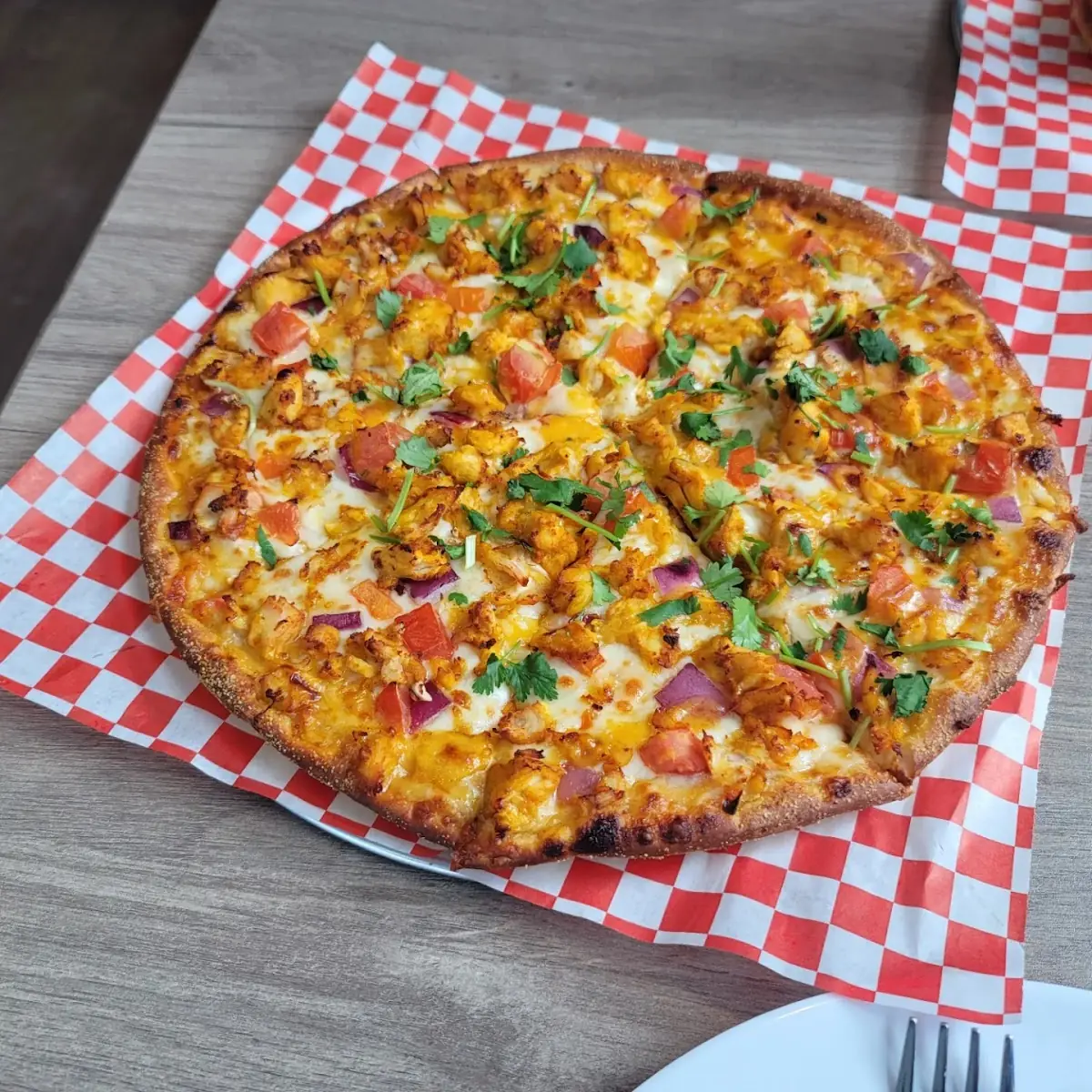 Loaded Vegetable and Meat Pizza