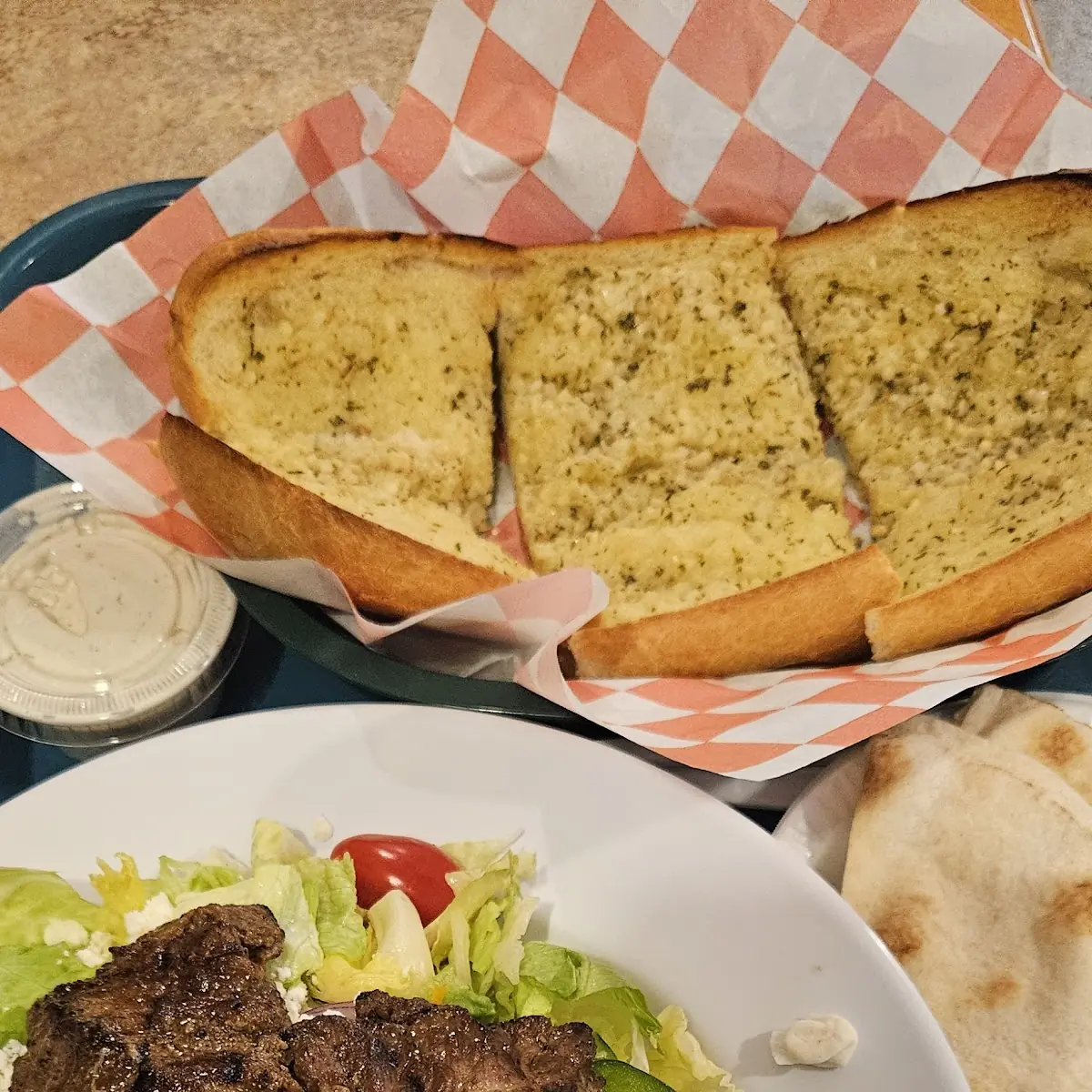 Steak Tip Salad and Garlic Bread
