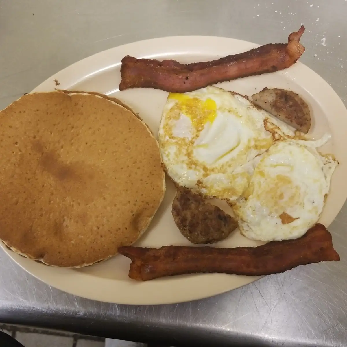 Pancakes and Eggs Bacon Sausage