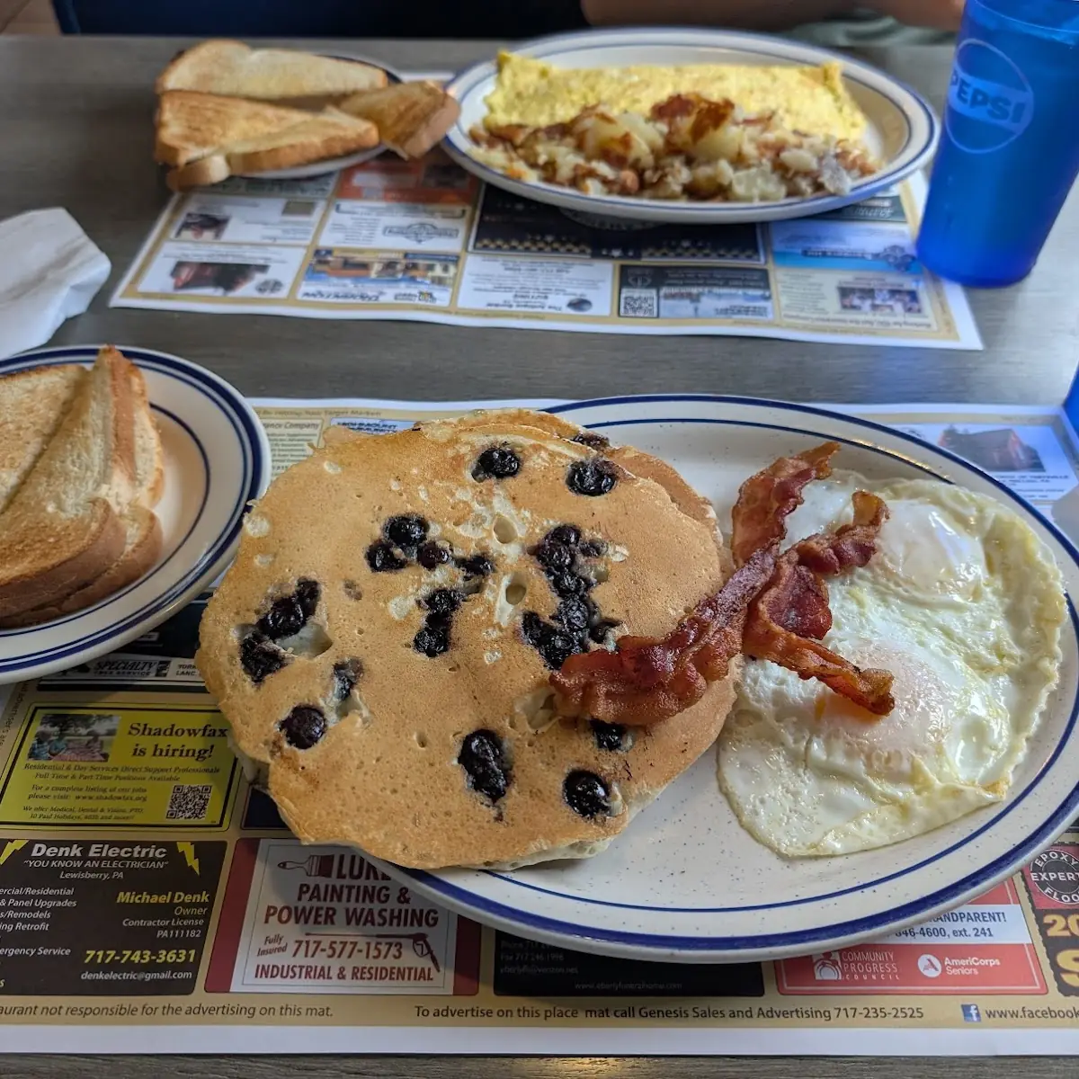 2 Eggs with Ham Bacon Sausage or Scrapple with Homefries and Buttered Toast