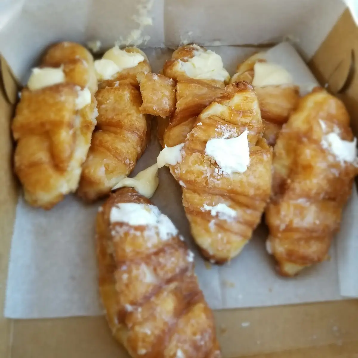 White Icing and Cream Cheese Croissants