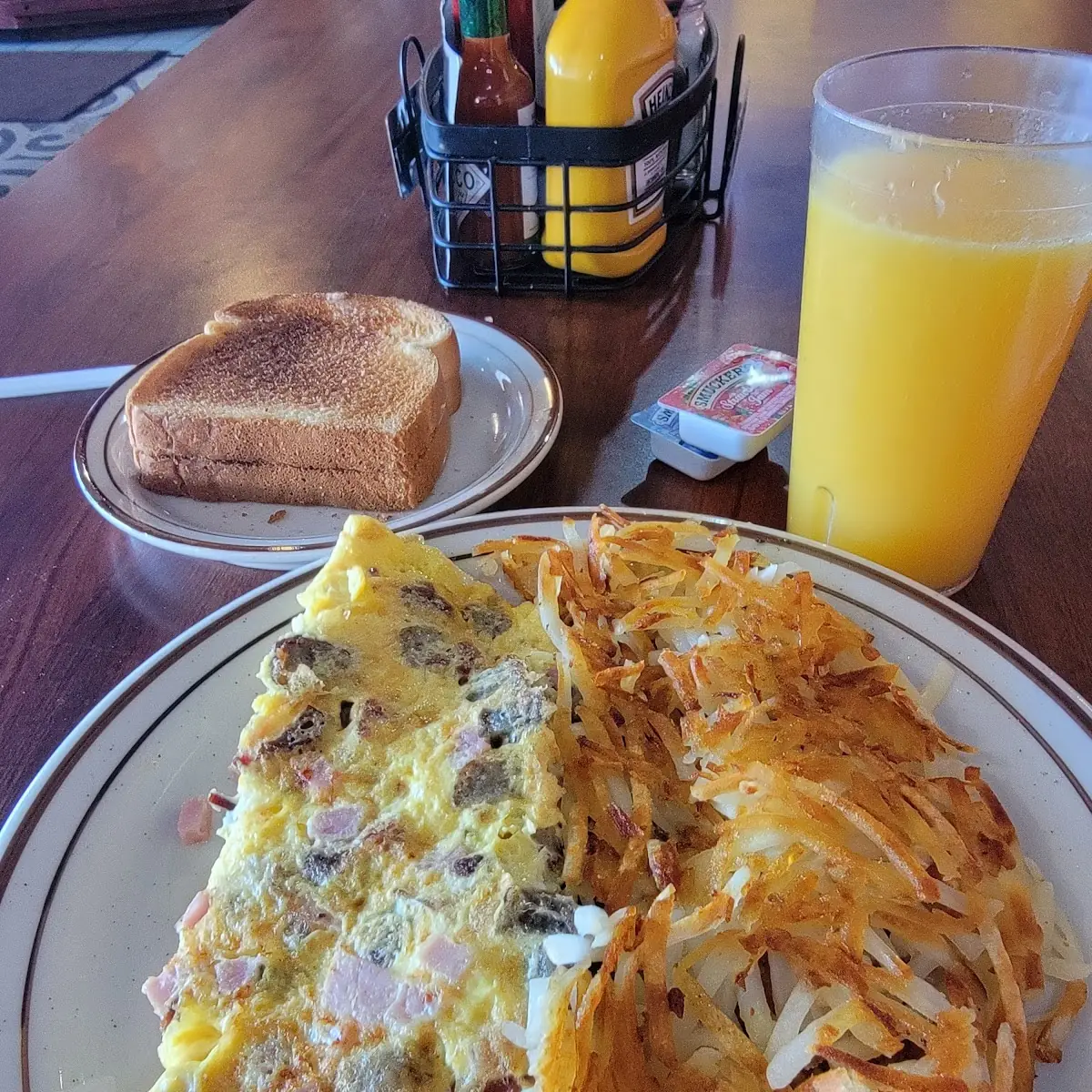Meat Lovers Omelette with Hash Browns
