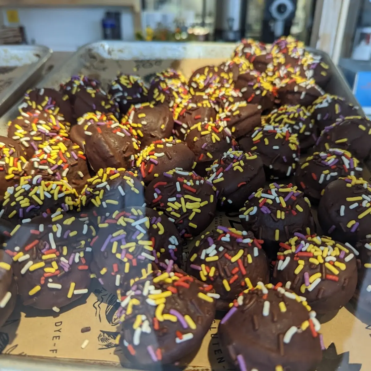 Chocolate Covered Donut Holes with Sprinkles