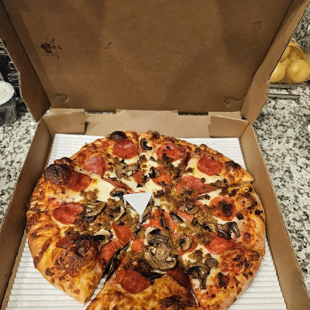 Pepperoni Sausage and Mushroom Pizza