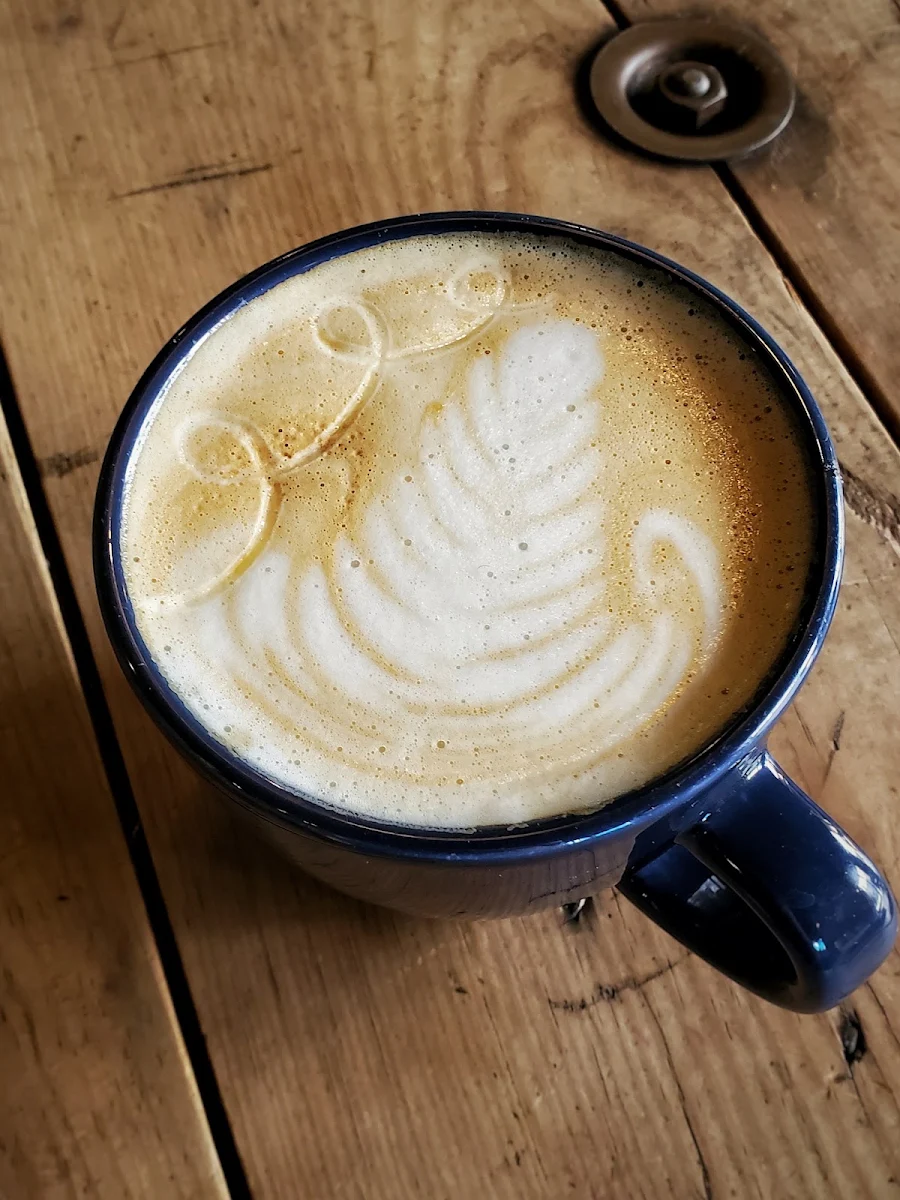 Latte Art on Wooden Table