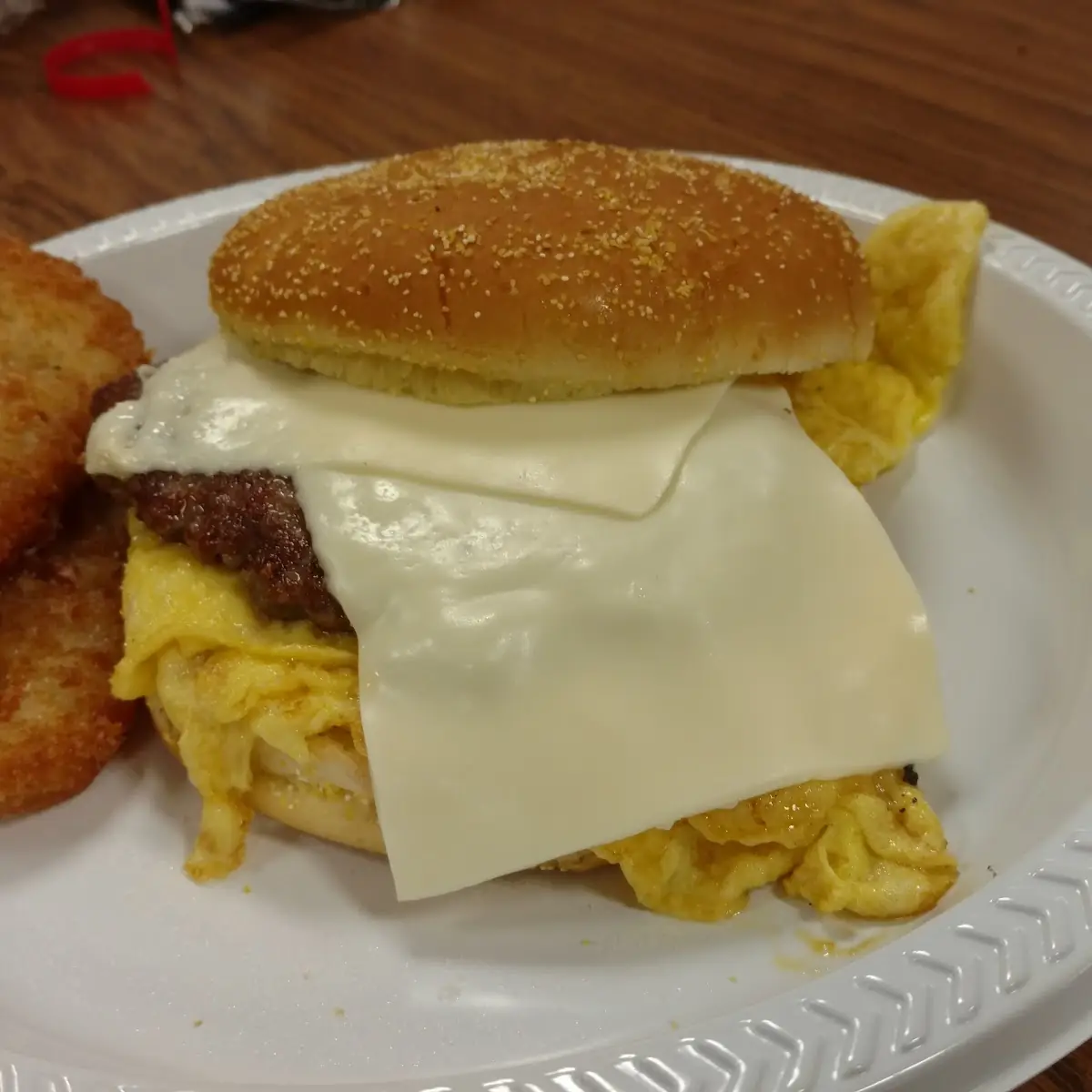 Sausage Egg and Cheese Sandwich with Hash Browns