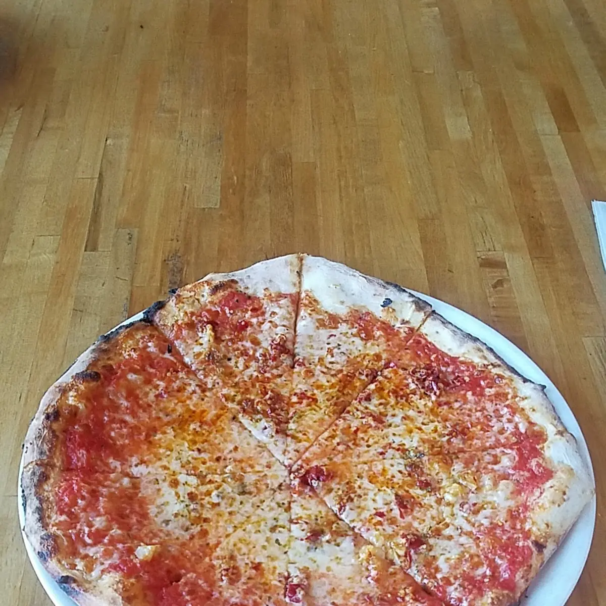 Arrabbiata Pizza Calabrian Chilies Roasted Garlic Oregano Mozzarella Parmesan Red Sauce