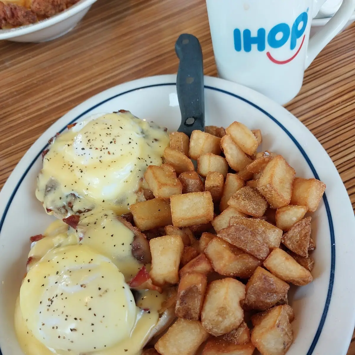 Eggs Benedict with Bourbon Bacon Jam and Country Potatoes
