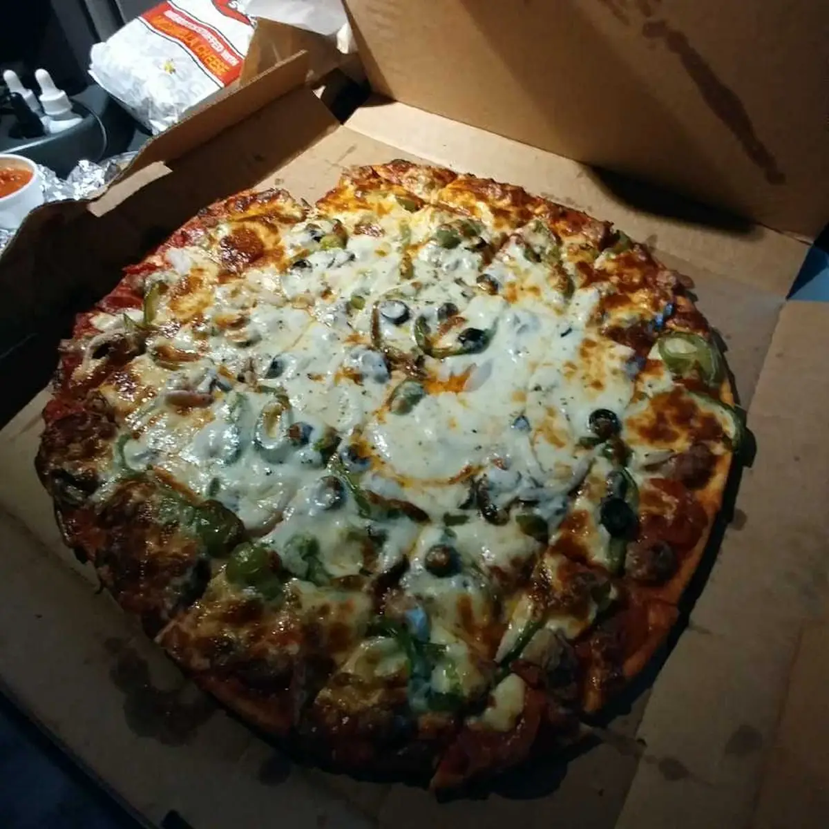 Thin Crust Supreme Pizza