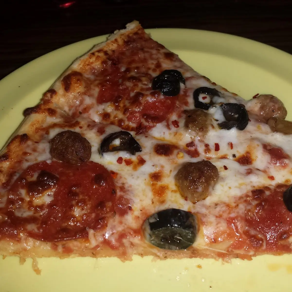 Sausage Pepperoni and Black Olive Pizza