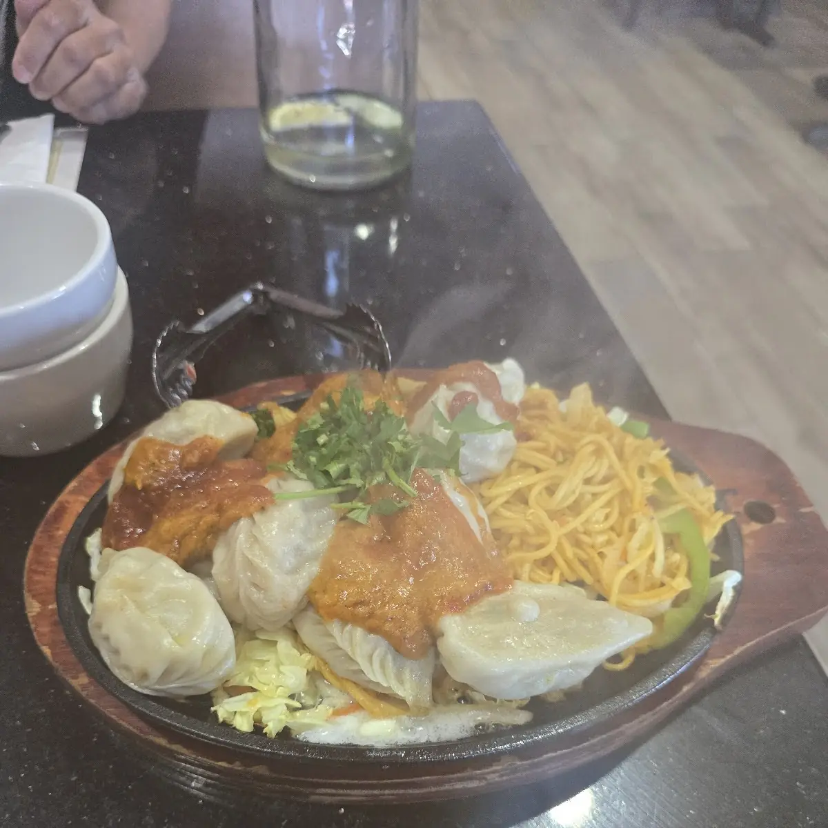Sizzling Chicken Momos with Noodles