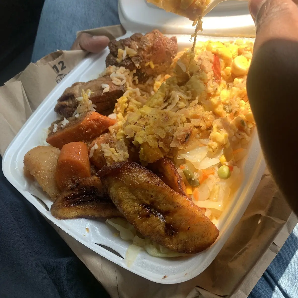 Ackee with Brown Stewed Chicken with White Rice and Fried Plantains