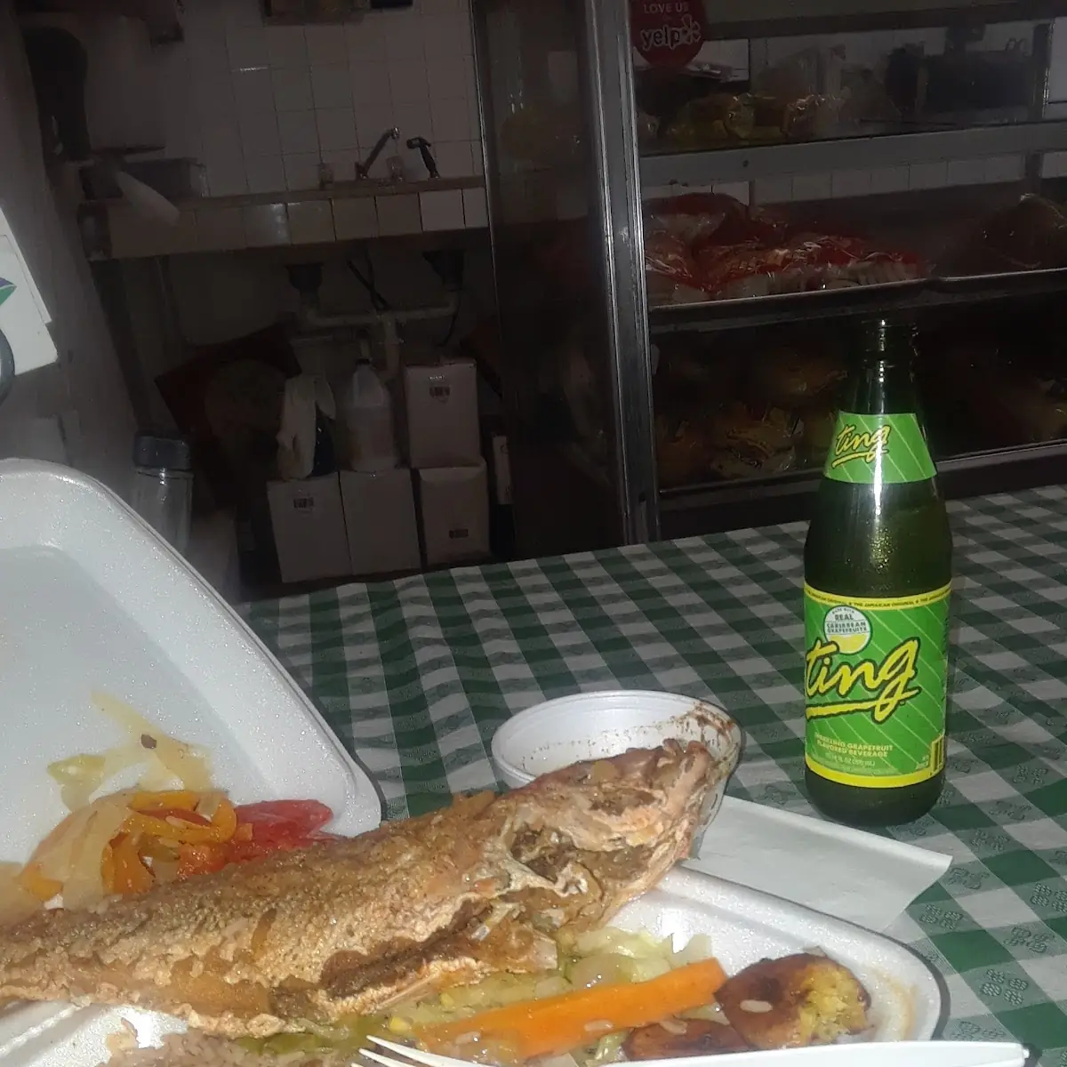 Fry Fish with Cabbage Rice and Peas and Plantains