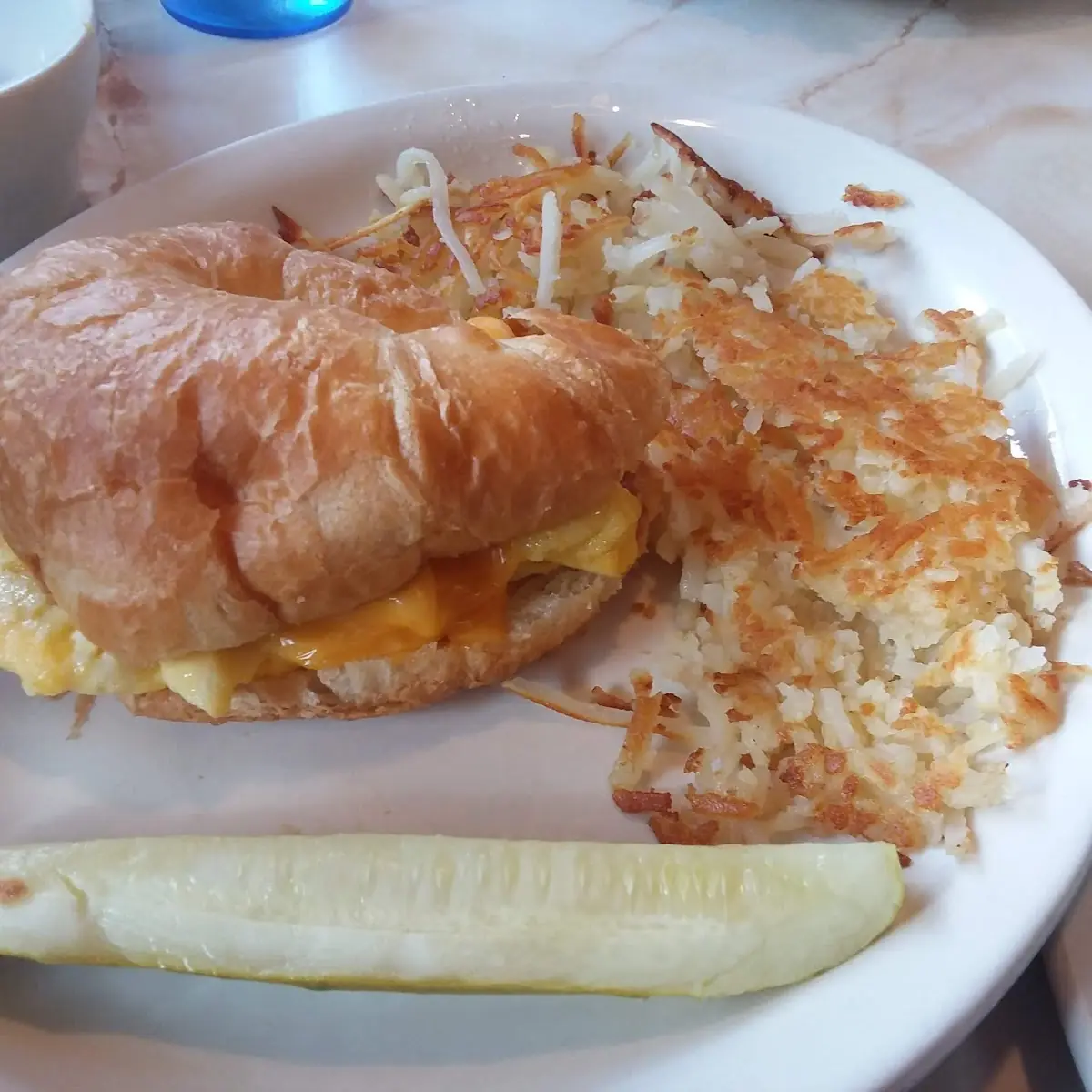 Egg and Cheese Croissant with Hash Brown