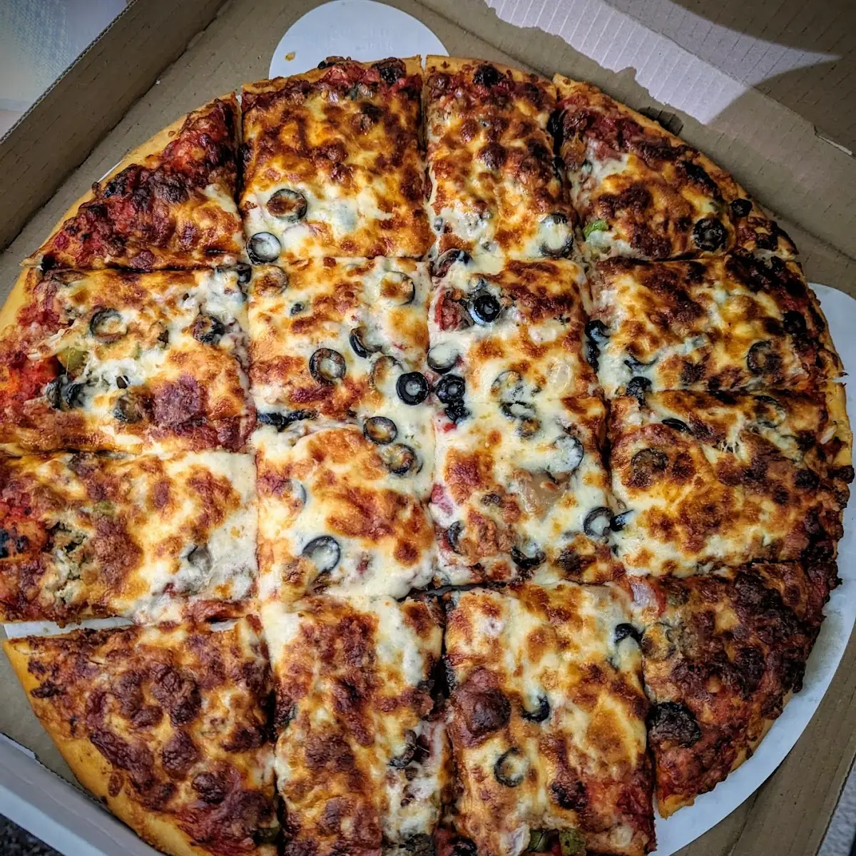 Supreme Pizza Well Done