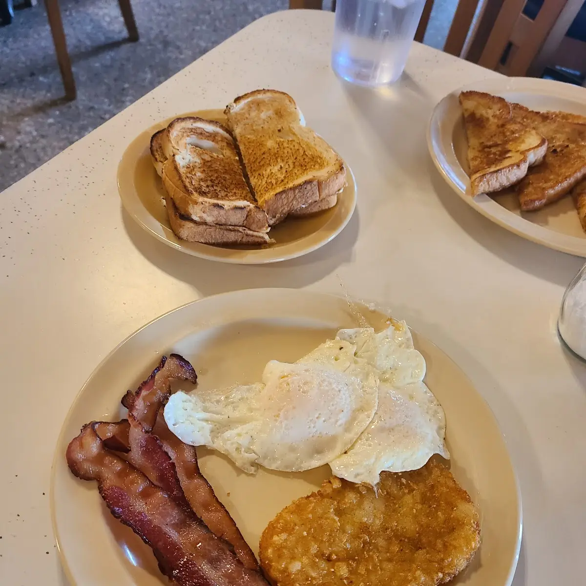 Two Eggs with Bacon and Hash Brown with Toast