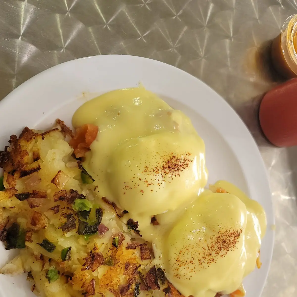 Eggs Benedict with Steak and Side of Hash Browns