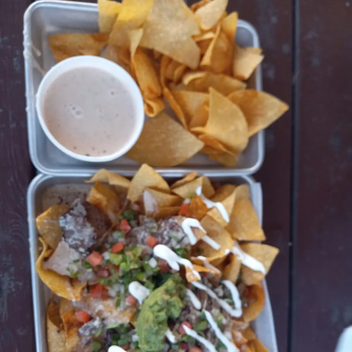 Steak Nachos Supreme and Queso