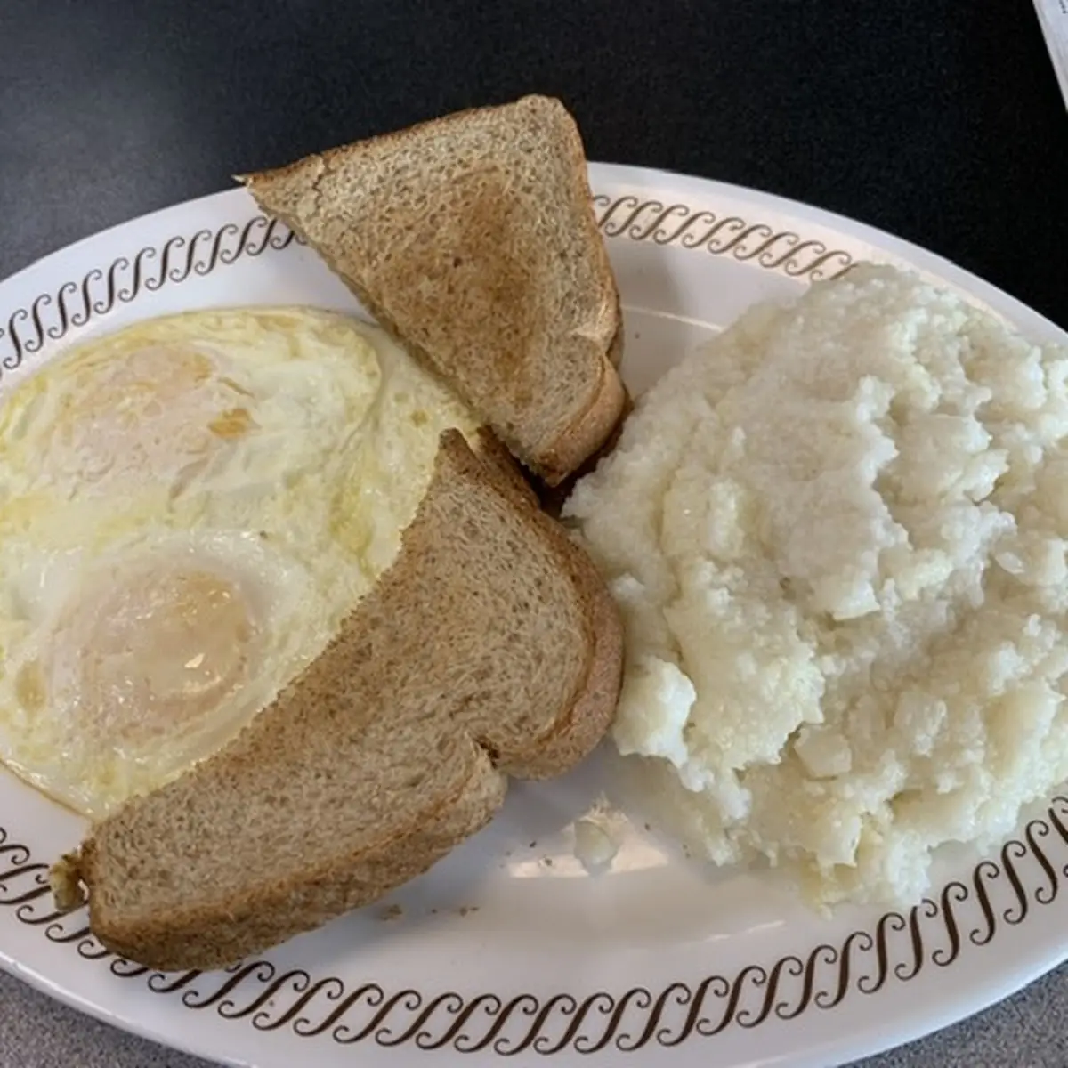 Eggs Sunny Side Up with Toast & Grits