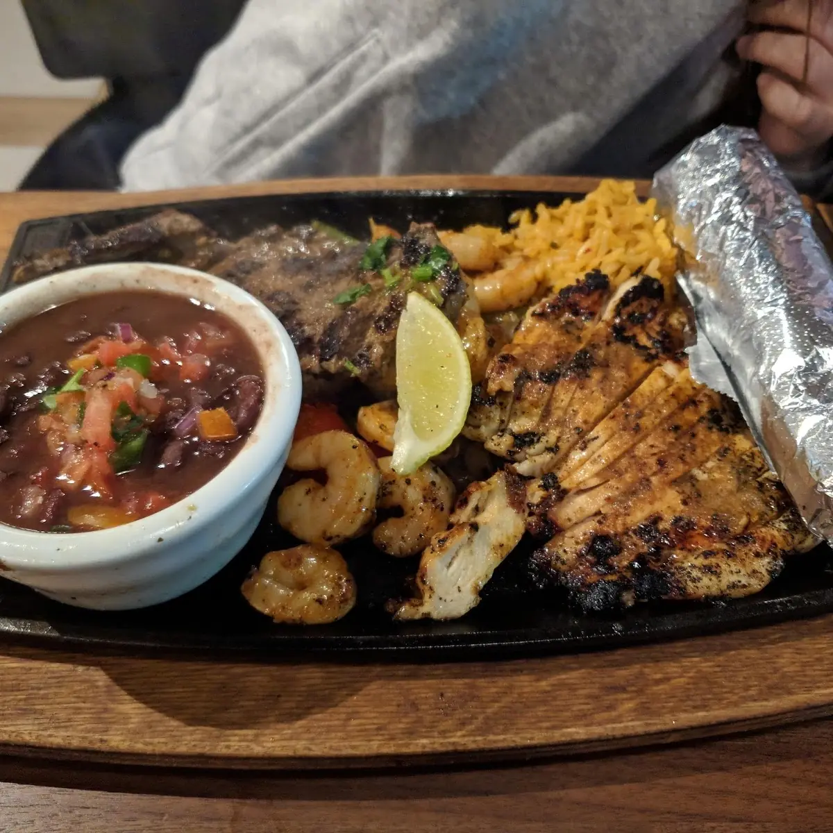 Shrimp Chicken and Steak Fajitas