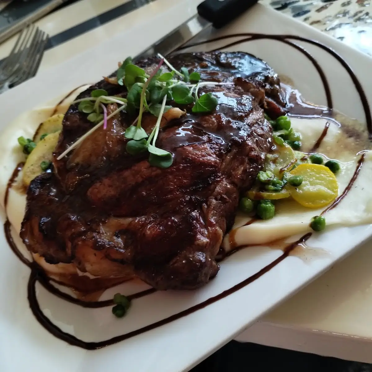 Hand-Cut Ribeye Topped w a Caramelized Onion and Red