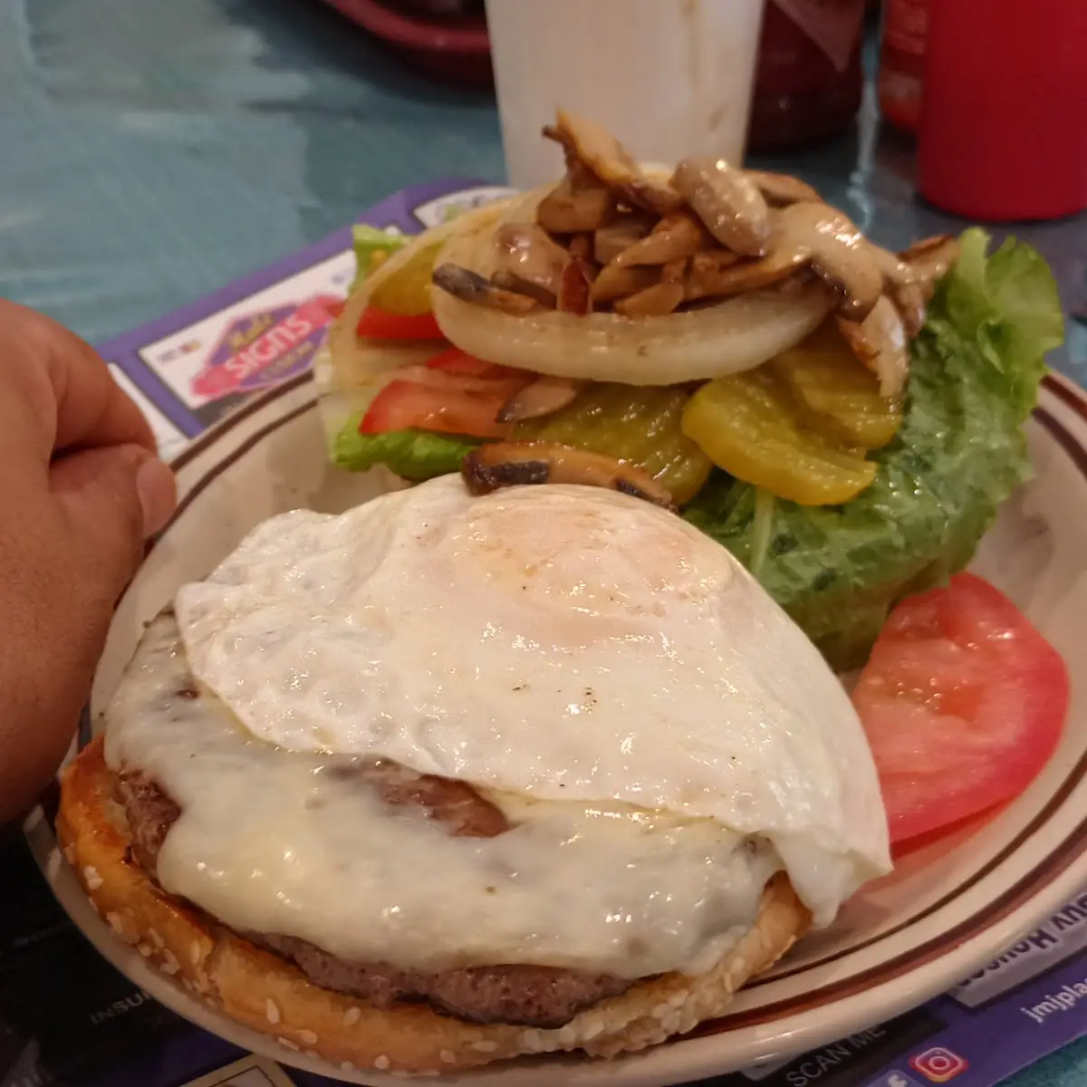 Double Cheeseburger with Sauteed Onions and Mushrooms with an Egg on Top