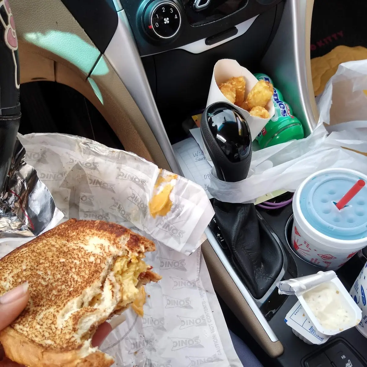 Bacon Egg and Cheese Breakfast Toaster with a Small Tot and Ocean Water Drink
