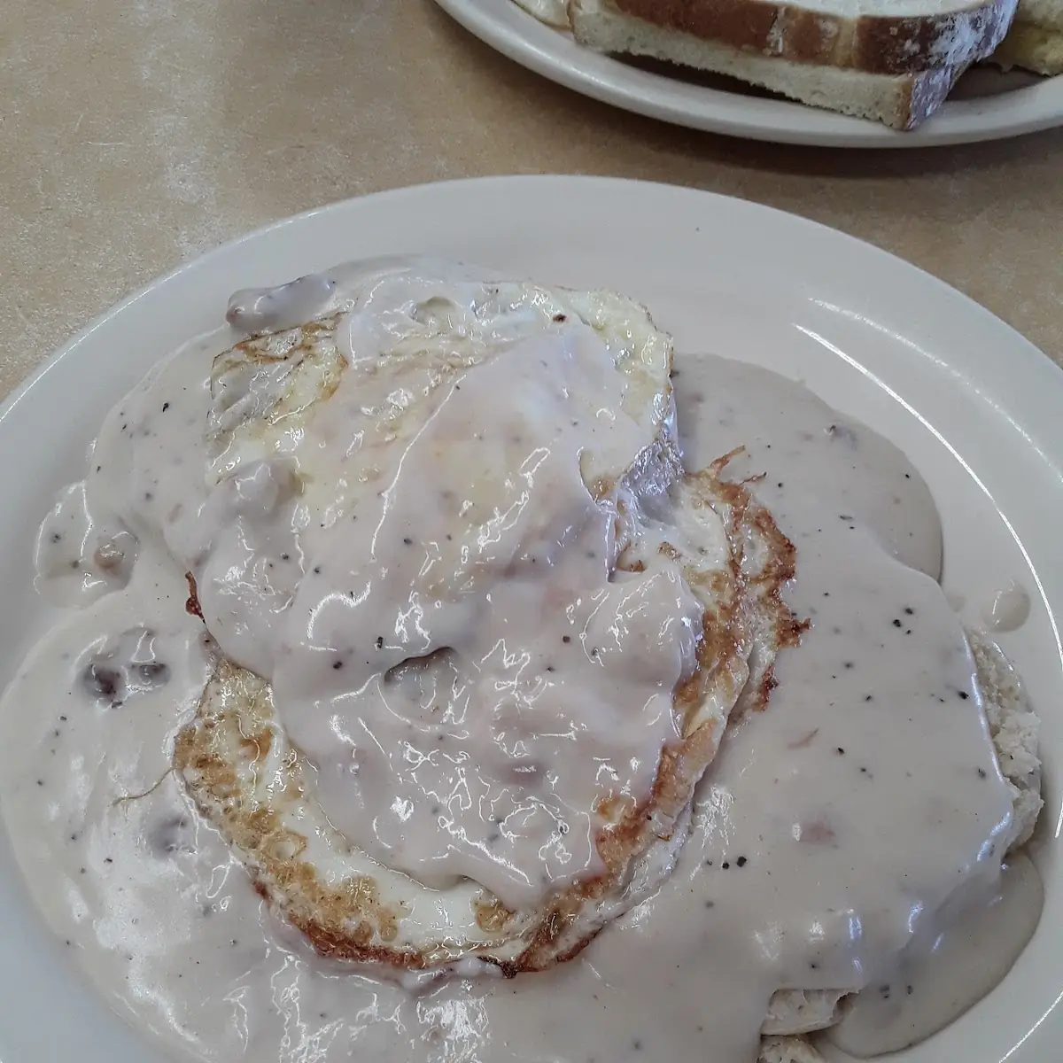 Biscuits and Gravy with Egg on Top