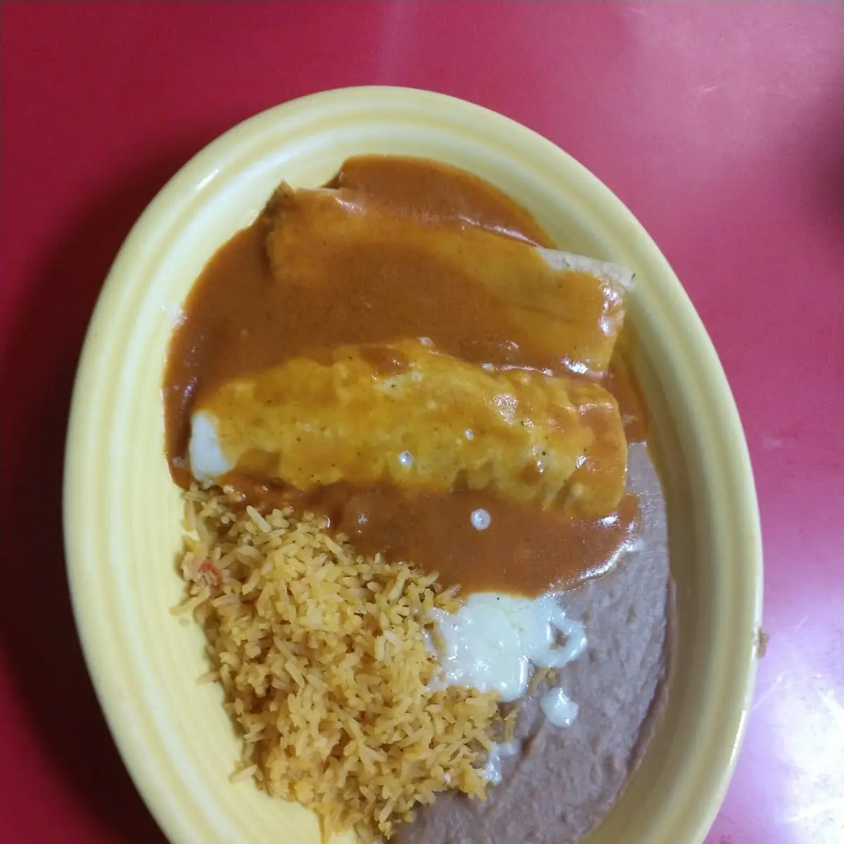 Combo 5 Two Enchiladas Rice & Beans