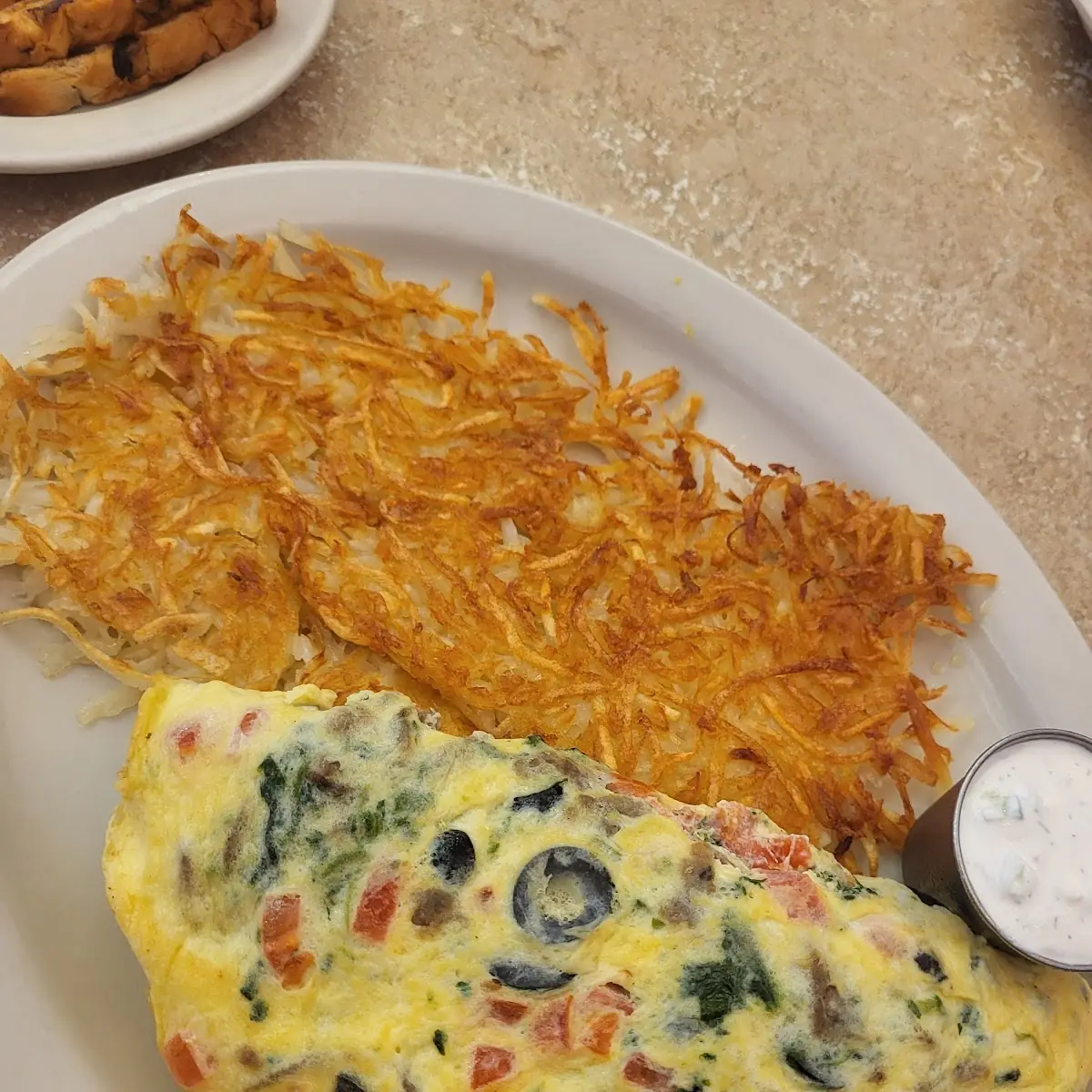 Spinach Tomato Omelette and Hash Browns