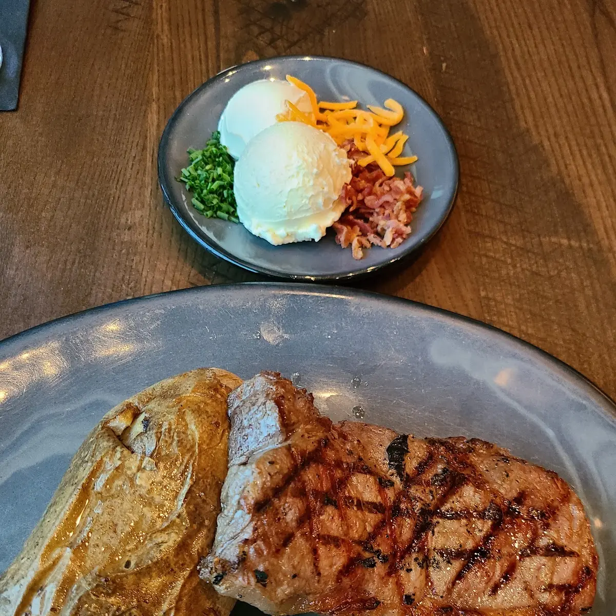12 Oz NY Steak & Loaded Baked Potato