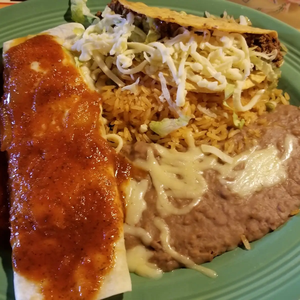 Beef Burrito with Mexican Rice and Refried Beans
