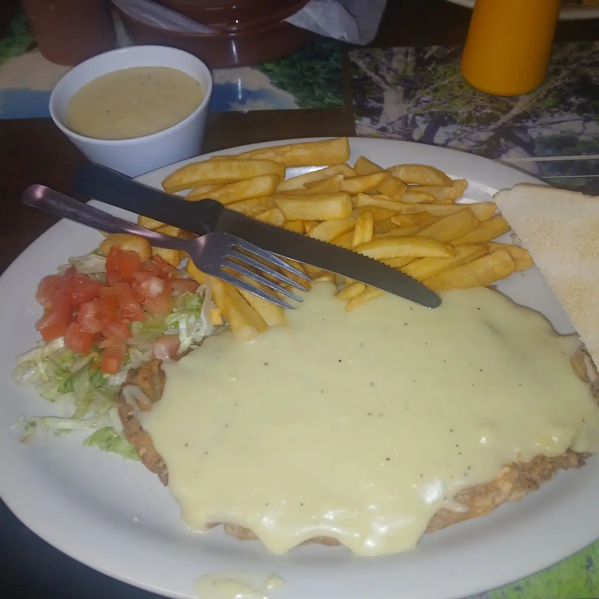 #20 - Chicken Fried Steak (Served with 2 eggs, Homemade Hash brown & Toast)