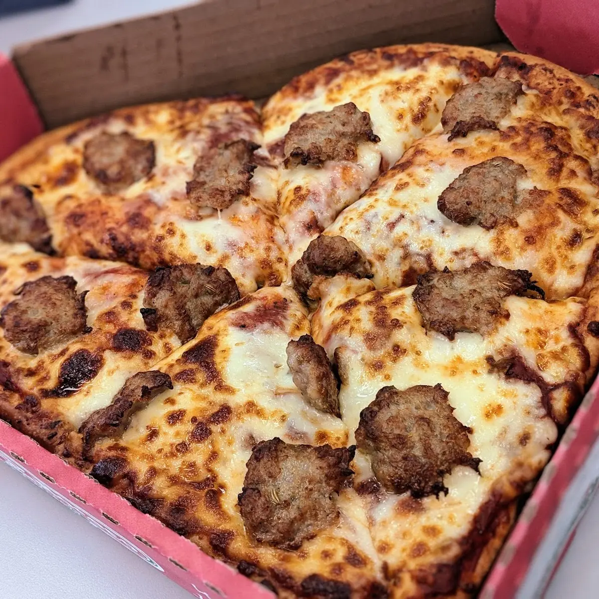 Heart Shaped Sausage Pizza