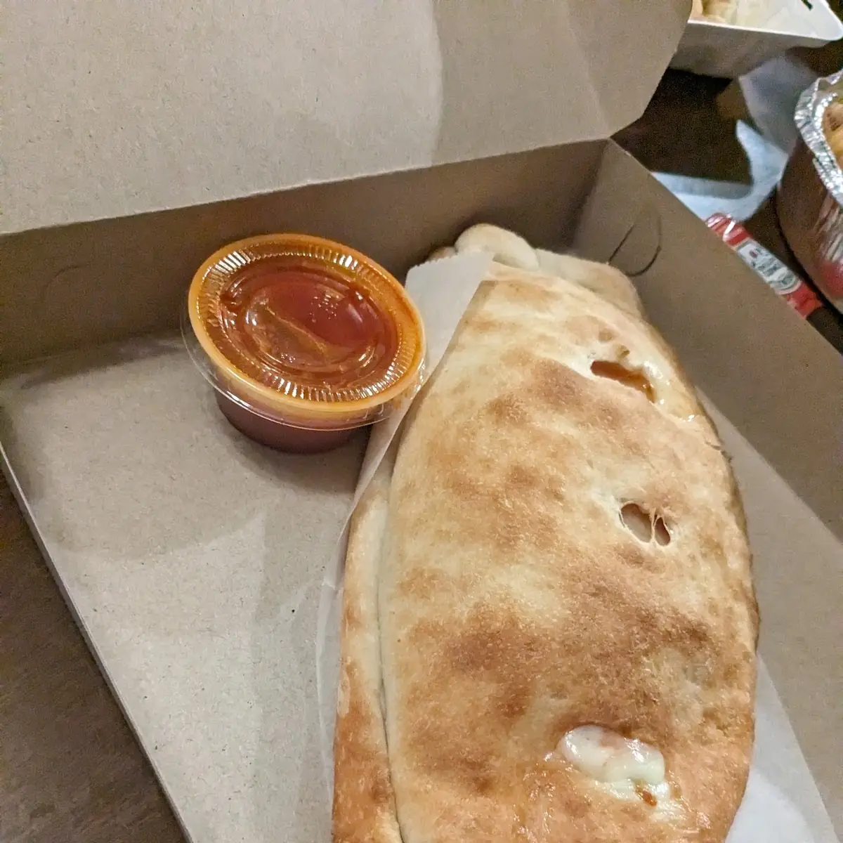 Ricotta Cheese Mozzarella Cheese & Ham Calzone
