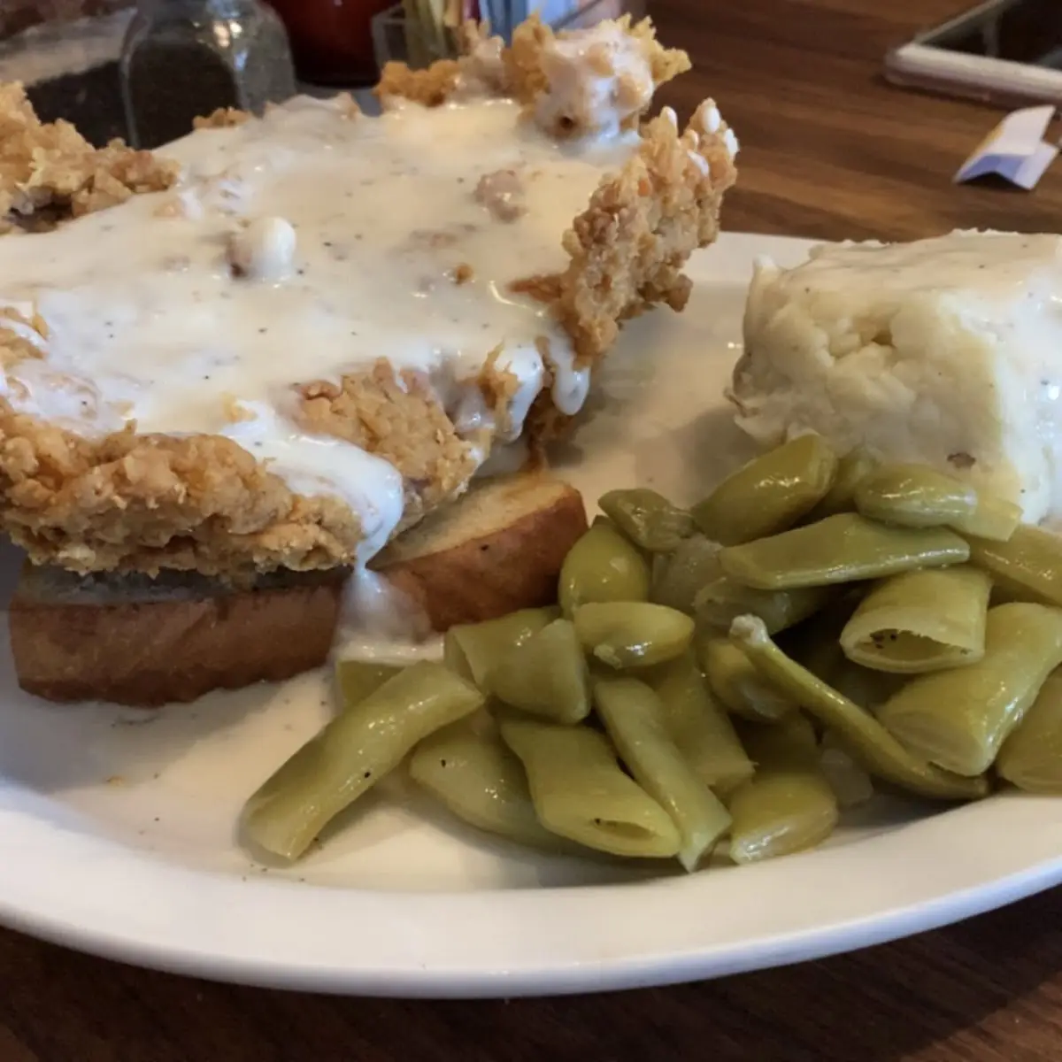 Chicken Fried Steak with Mashed Potatoes & Gravy and Red Beans and Rice