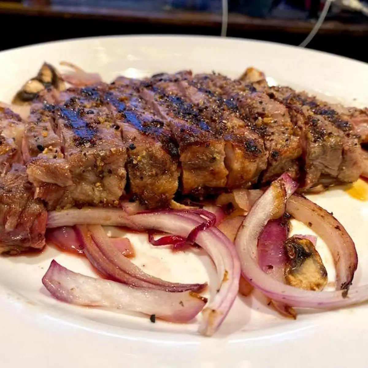 Rib Eye Steak with Onions