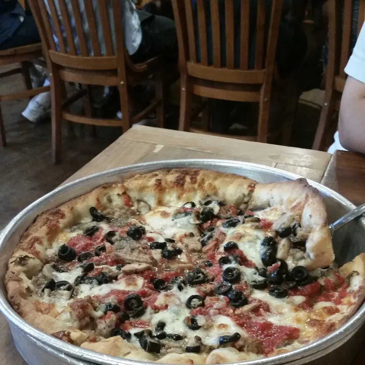 Deep Dish Wheat Crust with Extra Sauce Extra Cheese Pepperoni and Black Olives