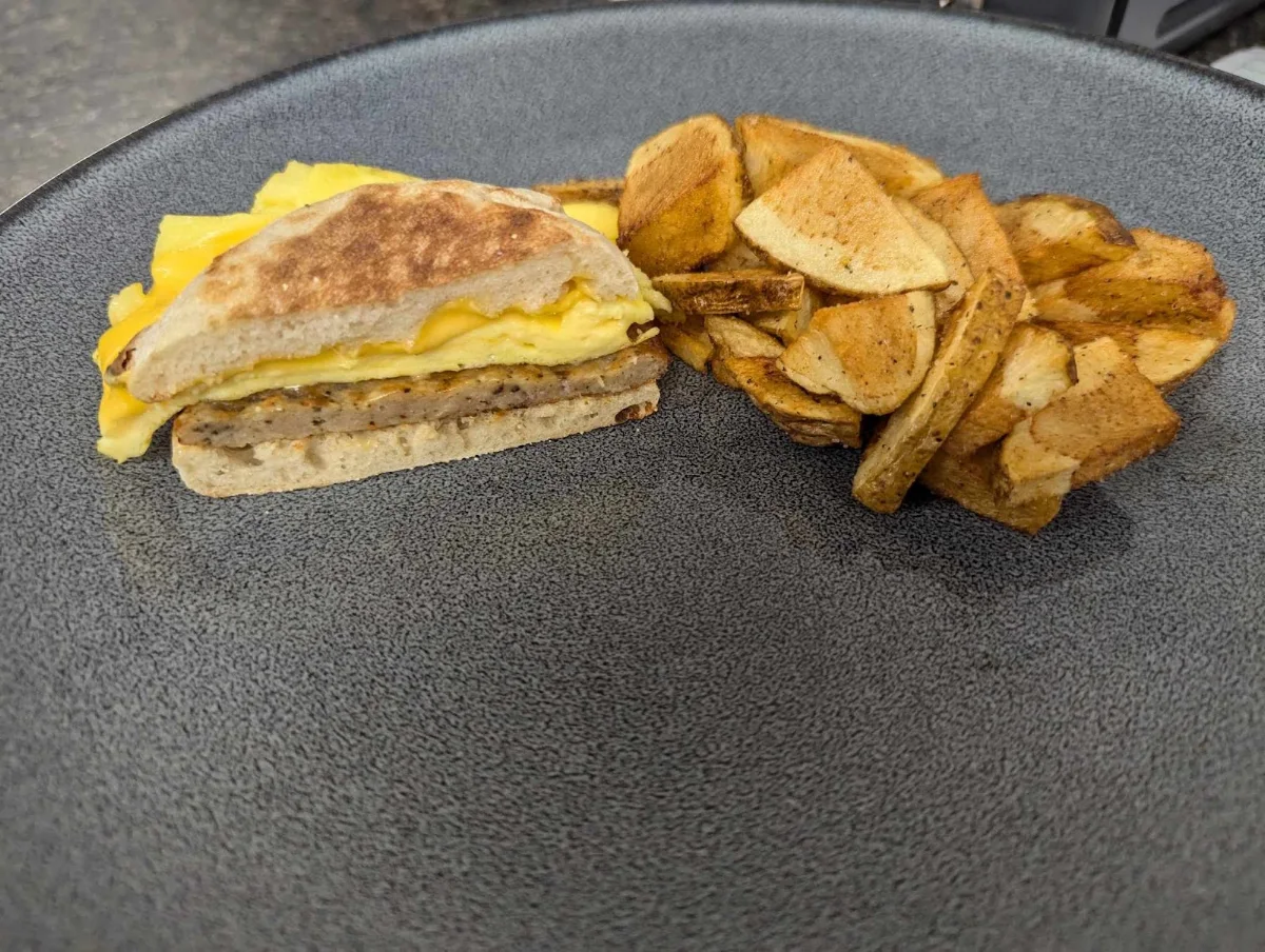 Sausage Egg and Cheese Muffin with Breakfast Potatoes