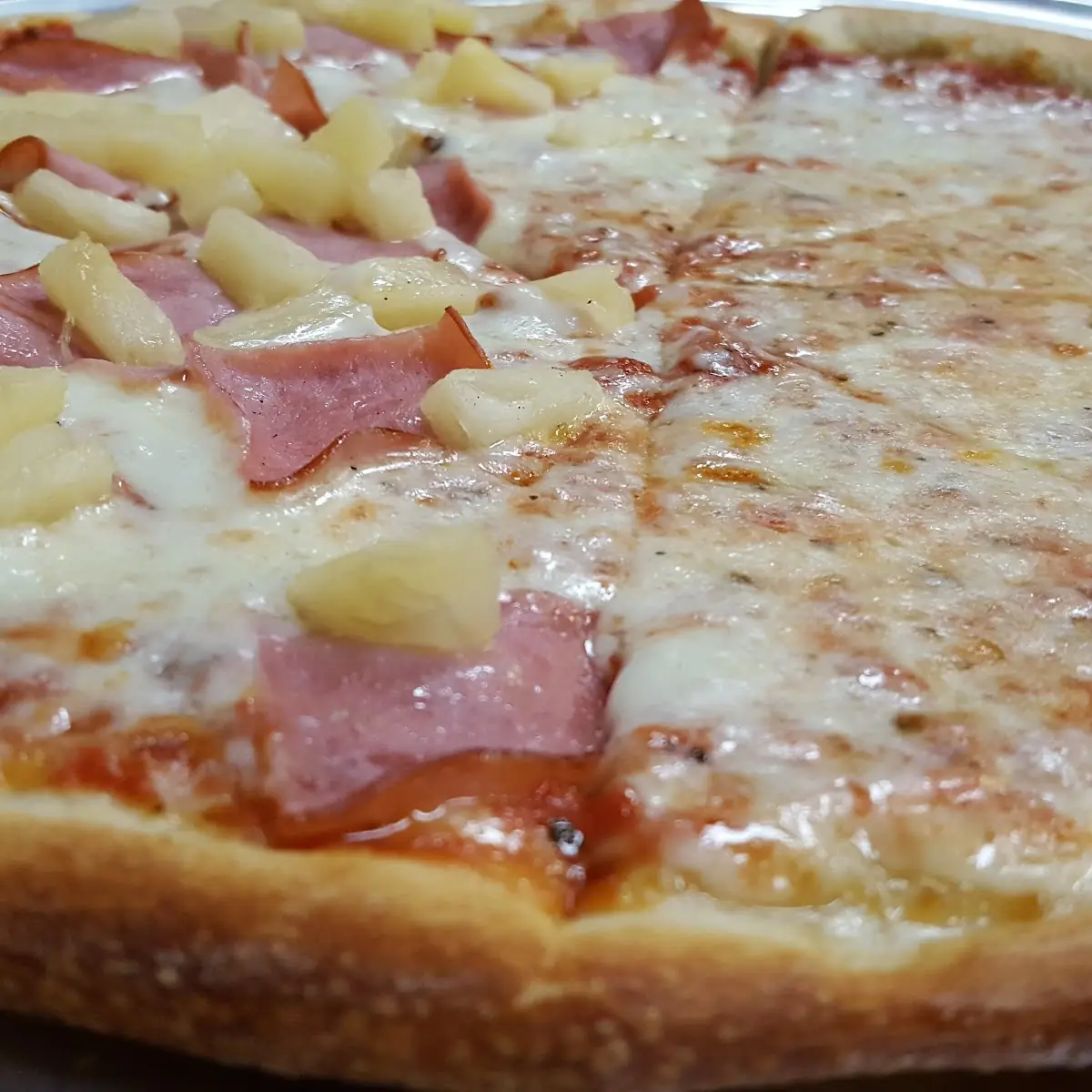 Cheese Pizza with Half Hawaiian Pizza