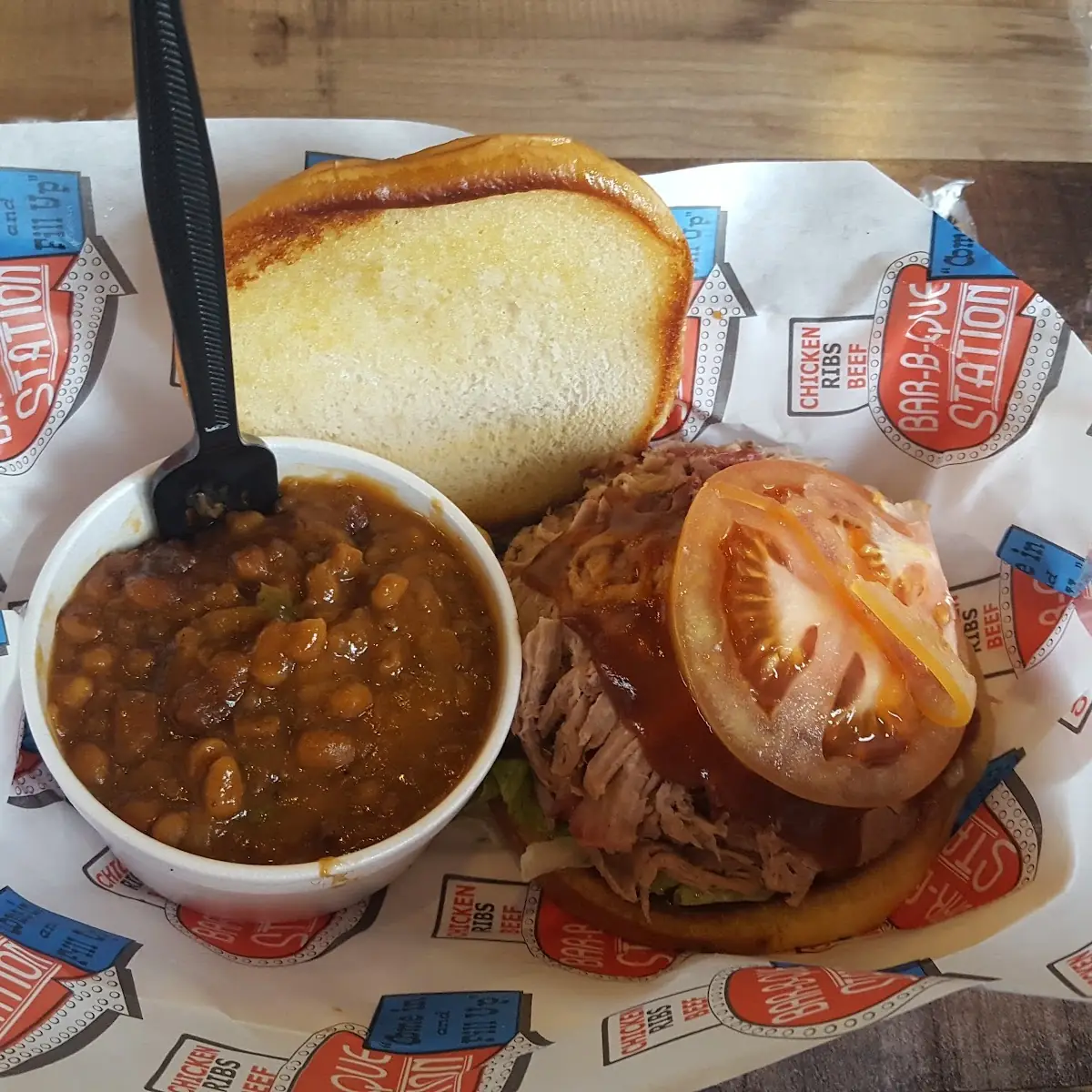Pulled Pork Sandwich Dressed Combo with Baked Beans on the Side