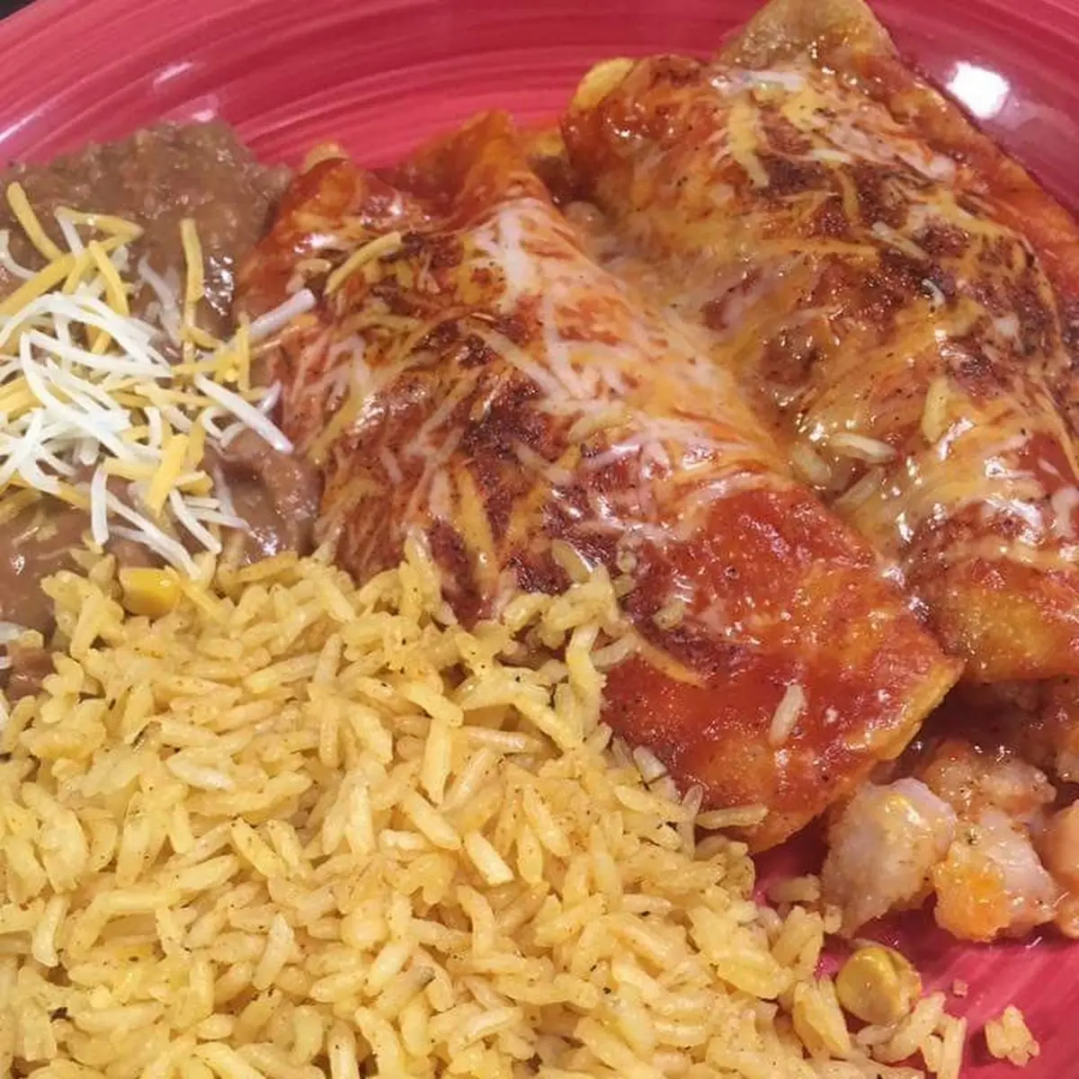 Cheese Enchiladas Rice and Refried Beans