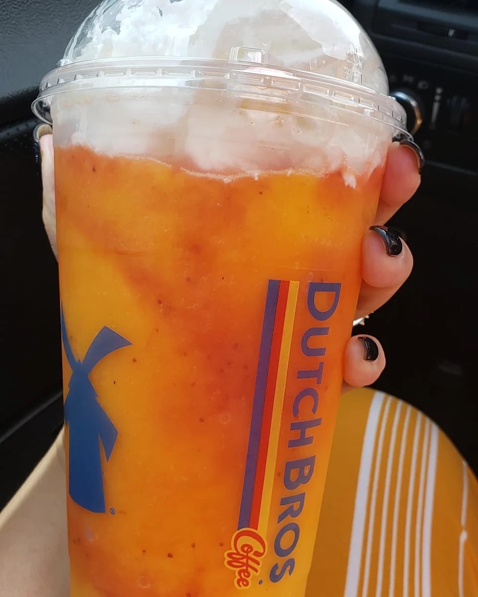 Lava Flow Mango Smoothie with Strawberry Drizzle with Whipped Cream