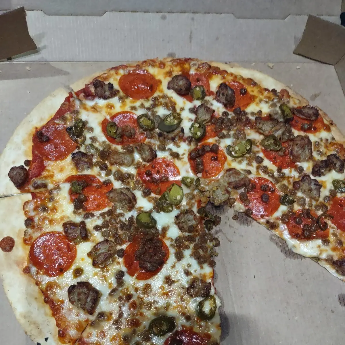 Thin Crust Pepperoni Ground Beef and Jalapenos Pizza
