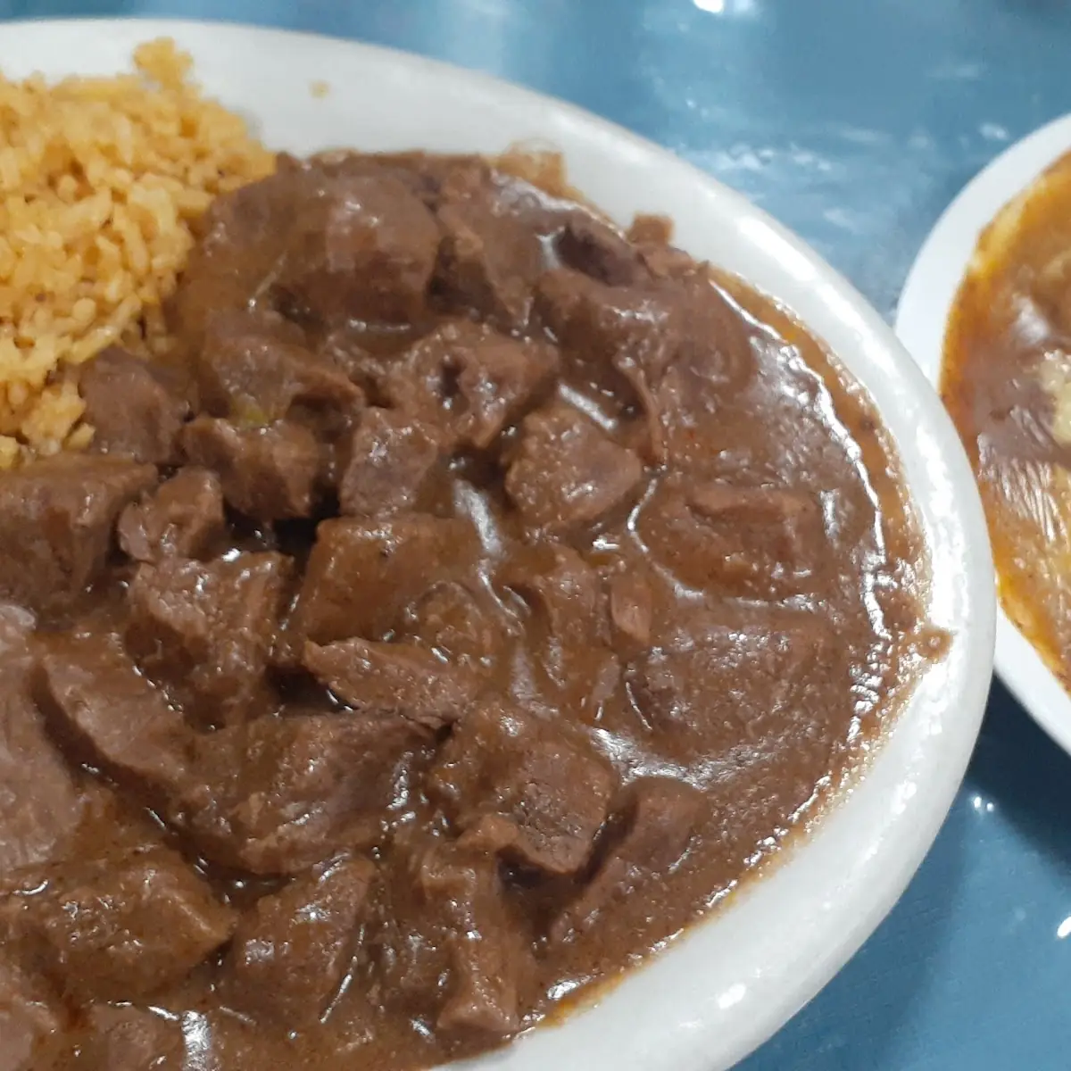 Carne Guisada Plate with 2 Extra Cheese Enchiladas