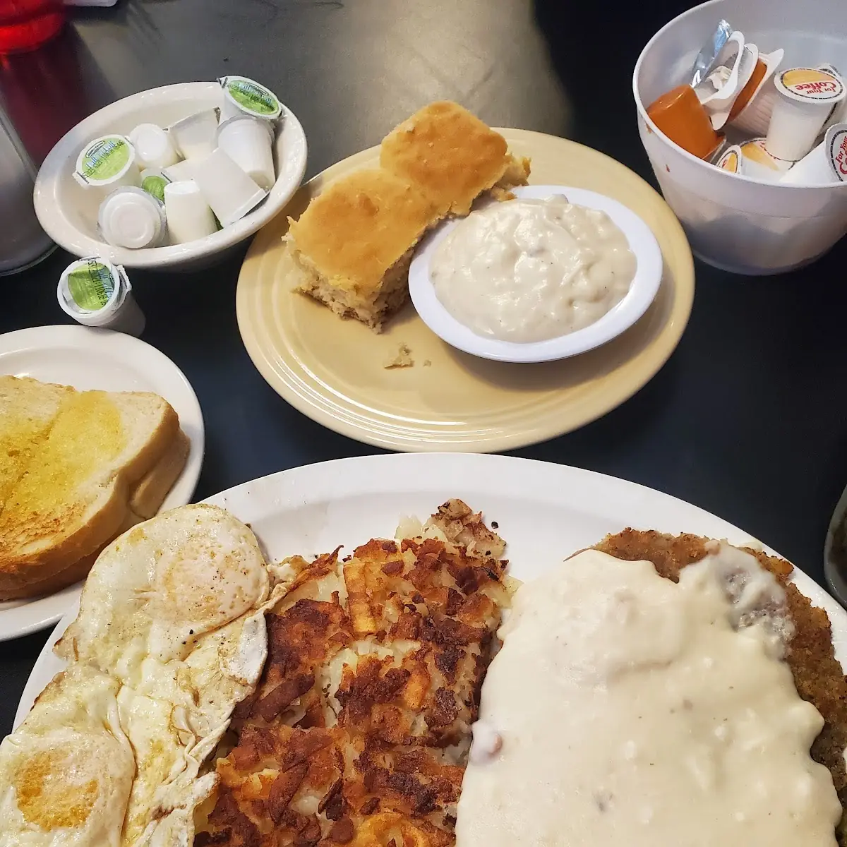 Country Fried Steak with Biscuits and Gravy and Hash Browns