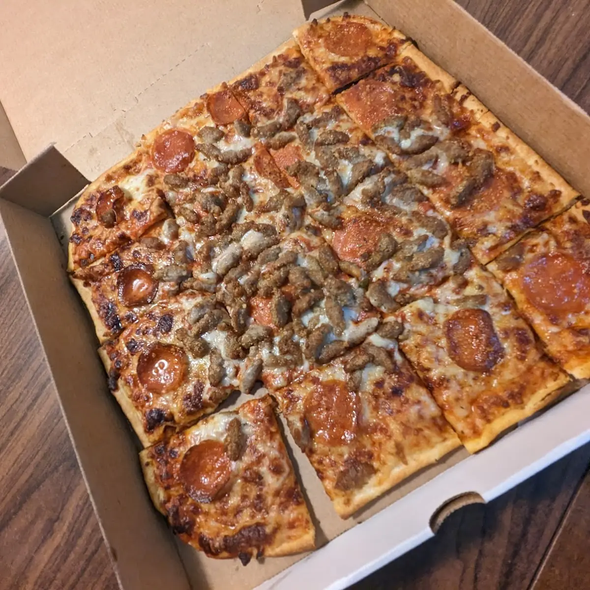 Thin Crust Sausage and Pepperoni Pizza