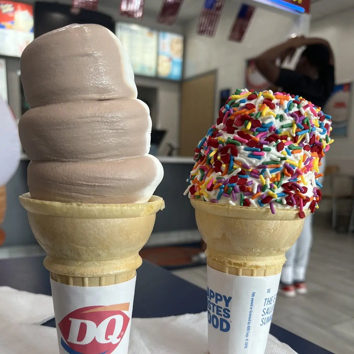 Large Swirl Cone and Vanilla Cone with Sprinkles