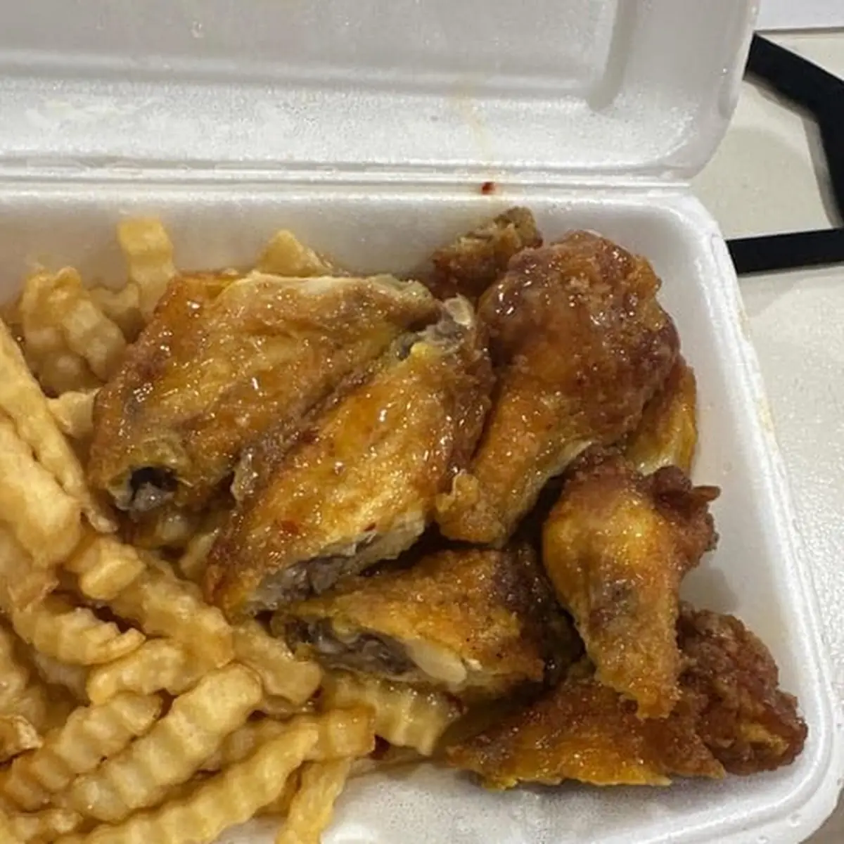 Glazed Chicken Wings in Takeout Container