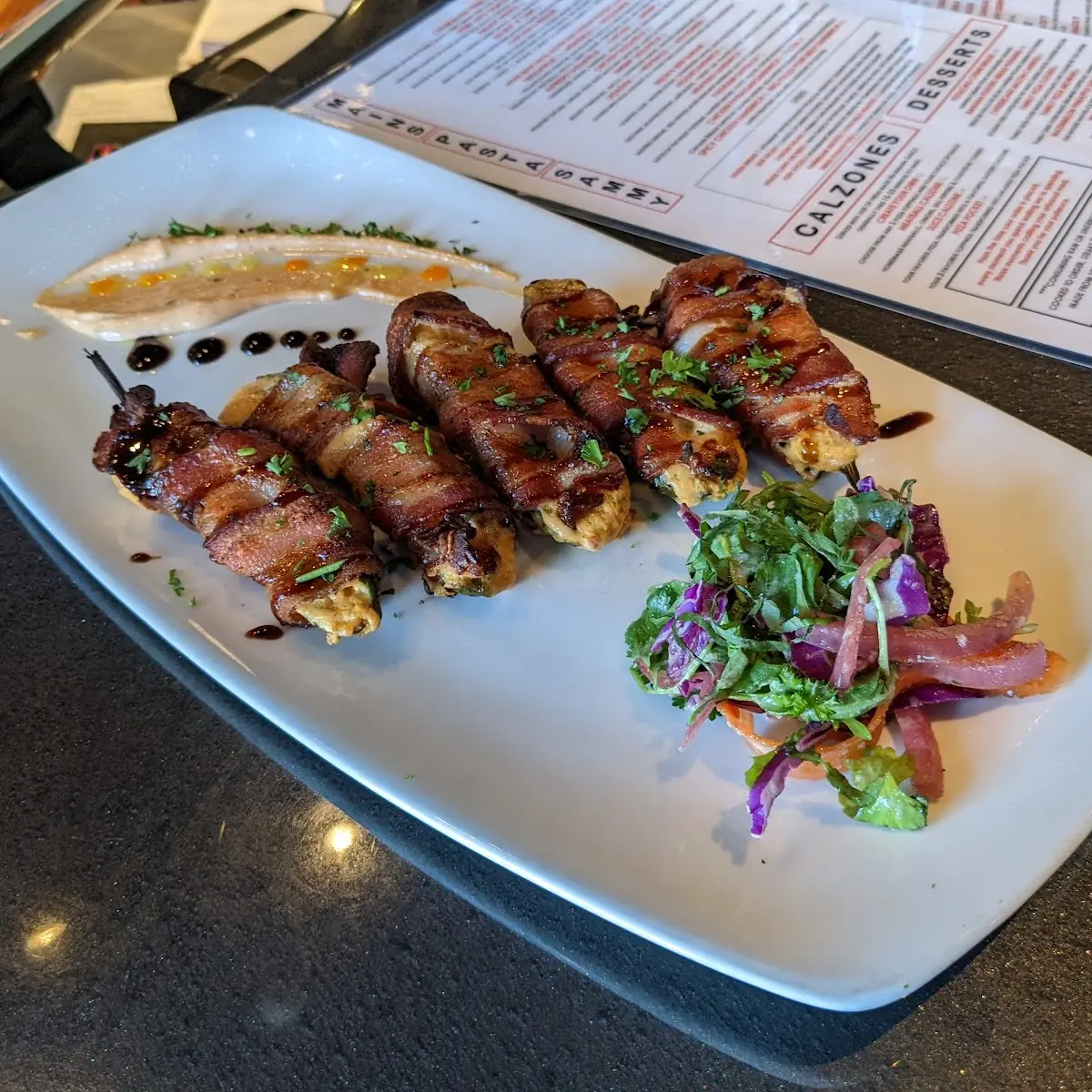 Stuffed Jalapeno Poppers Wrapped in Bacon